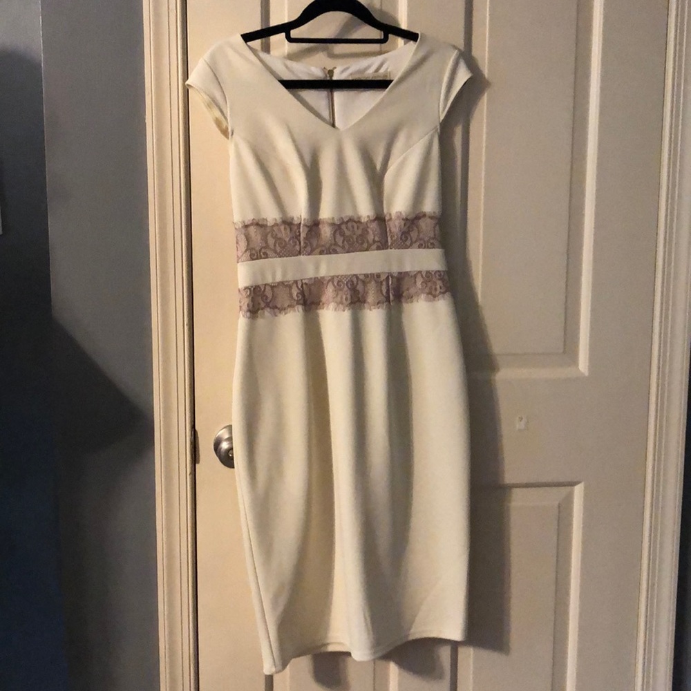 white dress with lace waist piece